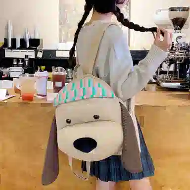 單倉 可爱搞怪小狗玩偶设计背包旅行日常通勤百搭学院风 布 双肩包 女款 卡其色