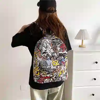 單倉 潮流时尚涂鸦个性印花设计通勤百搭背包初高中学生大容量轻便耐磨书包 帆布 双肩包 常规 男女同款情侣款 黑色