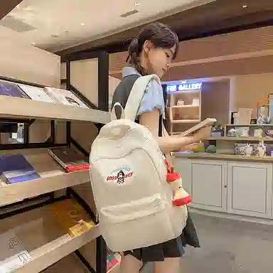 單倉 高级感简约可爱小狗卡通设计通勤百搭背包初高中学生大容量轻便耐磨书包 尼龙 双肩包 常规 男女同款情侣款 白色/黄色/蓝色/黑色