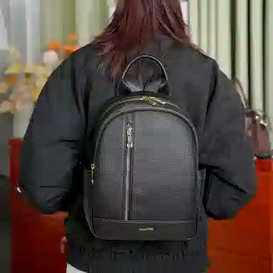 木林森 休闲简约学生书包韩版轻便实用上班通勤背包 聚氨酯 双肩包 常规 男女同款情侣款 黑色