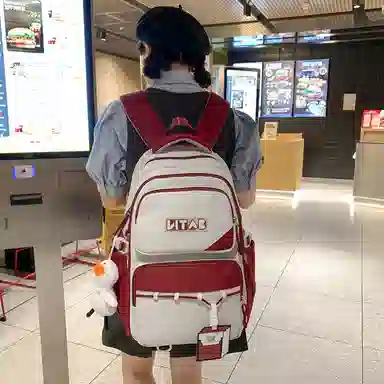 行途 韩版简约大容量中学生初中生减负高中 尼龙 双肩包 女款 黑色/桔色/红色/卡其色/绿色
