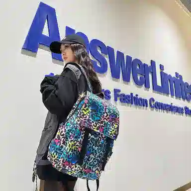 行途 韩版时尚休闲大容量校园日系翻盖豹纹 尼龙 双肩包 常规 男女同款情侣款 白色/蓝色/粉色