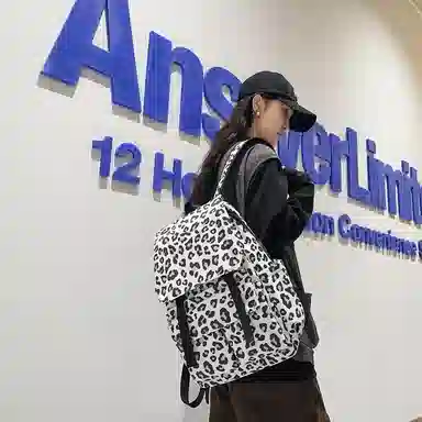 行途 韩版时尚休闲大容量校园日系翻盖豹纹 尼龙 双肩包 常规 男女同款情侣款 白色/蓝色/粉色