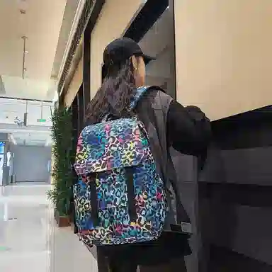 行途 韩版时尚休闲大容量校园日系翻盖豹纹 尼龙 双肩包 常规 男女同款情侣款 白色/蓝色/粉色