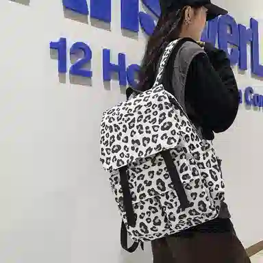 行途 韩版时尚休闲大容量校园日系翻盖豹纹 尼龙 双肩包 常规 男女同款情侣款 白色/蓝色/粉色