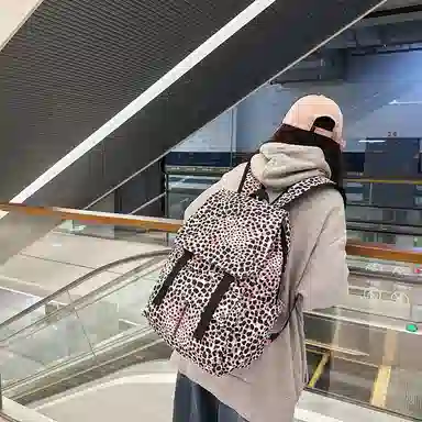 行途 韩版时尚休闲大容量校园日系翻盖豹纹 尼龙 双肩包 常规 男女同款情侣款 白色/蓝色/粉色