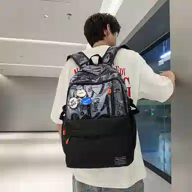 行途 个性涂鸦中学生书包日系潮牌大学生旅行背包 尼龙 双肩包 男女同款情侣款 黑色/白色/蓝色