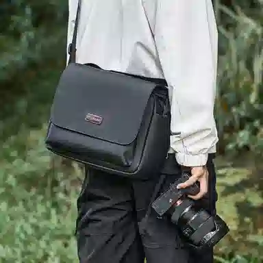 稻草人 防泼水防撞多功能轻便外出便携轻便简约休闲实用高颜值男士 混合织物 单肩包斜挎包相机包 常规 男女同款情侣款 黑色
