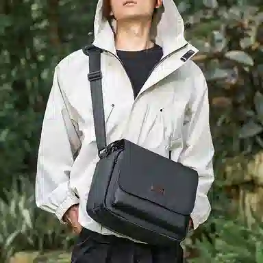 稻草人 防泼水防撞多功能轻便外出便携轻便简约休闲实用高颜值男士 混合织物 单肩包斜挎包相机包 常规 男女同款情侣款 黑色