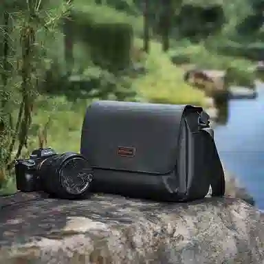 稻草人 防泼水防撞多功能轻便外出便携轻便简约休闲实用高颜值男士 混合织物 单肩包斜挎包相机包 常规 男女同款情侣款 黑色