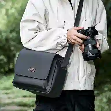 稻草人 防泼水防撞多功能轻便外出便携轻便简约休闲实用高颜值男士 混合织物 单肩包斜挎包相机包 常规 男女同款情侣款 黑色