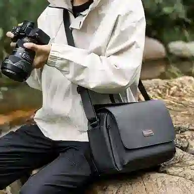 稻草人 防泼水防撞多功能轻便外出便携轻便简约休闲实用高颜值男士 混合织物 单肩包斜挎包相机包 常规 男女同款情侣款 黑色