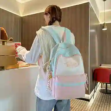 泰格奴 撞色系轻便百搭背包气质高级感潮流时尚初中高中大学生上课书包 尼龙 双肩包 男女同款情侣款 粉色/蓝色/红色/棕色