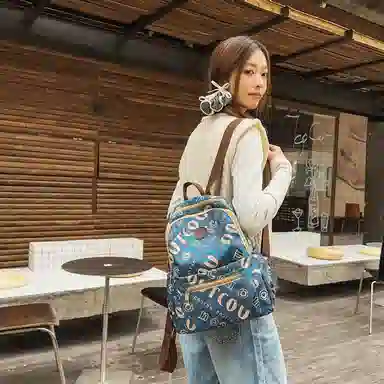 泰格奴 涂鸦精美机能通勤旅行小清新轻便高颜值背包初中高中大学生上课百搭 尼龙 双肩包 女款 孔雀蓝