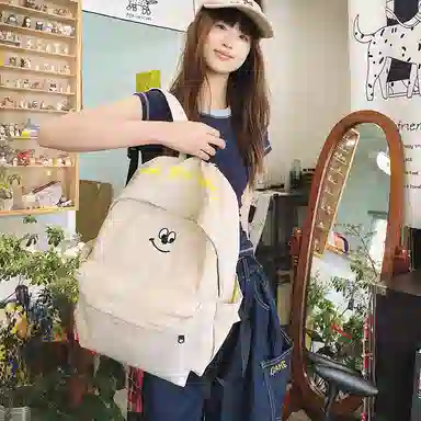 泰格奴 涂鸦通勤旅行小清新轻便高颜值大容量背包初中高中大学生上课百搭书包 尼龙 双肩包 男女同款情侣款 米白色/浅蓝色/藏青色/黑色