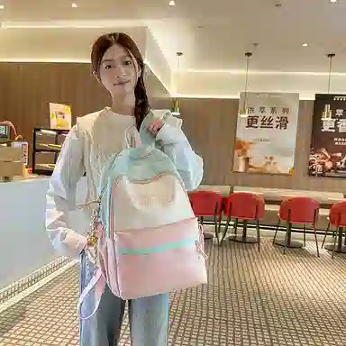 泰格奴 撞色系轻便百搭背包气质高级感潮流时尚初中高中大学生上课书包 尼龙 双肩包 男女同款情侣款 粉色/蓝色/红色/棕色