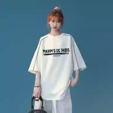 maxim's de paris logoT