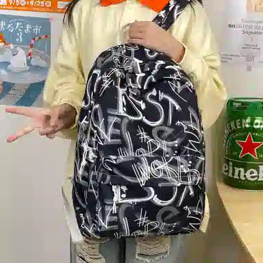 南潇湘 小清新休闲高颜值精美潮版韩版背包初中生高中生大学生上课百搭书包 尼龙 双肩包 男女同款情侣款 蓝色/绿色/红色/黑色