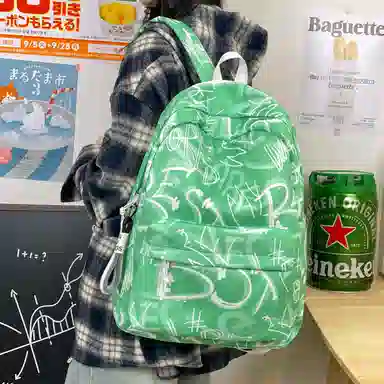 南潇湘 小清新休闲高颜值精美潮版韩版背包初中生高中生大学生上课百搭书包 尼龙 双肩包 男女同款情侣款 蓝色/绿色/红色/黑色