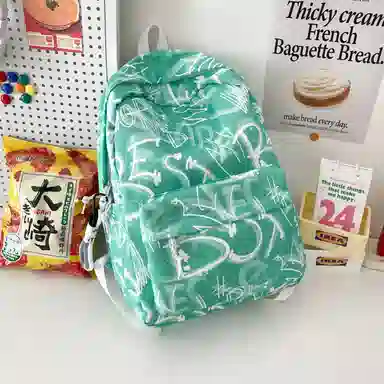 南潇湘 小清新休闲高颜值精美潮版韩版背包初中生高中生大学生上课百搭书包 尼龙 双肩包 男女同款情侣款 蓝色/绿色/红色/黑色