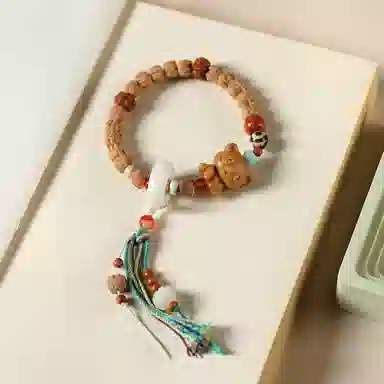子婳 诸事顺利平安吉祥新中式复古设计国潮时尚百搭配饰檀木小熊藏式民族风流苏跑环#好运 柏香籽/百香籽 手串 男款