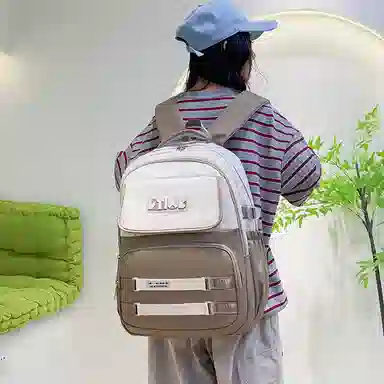 米囹 初中小学生背包 透气舒适 书包 常规 黑色
