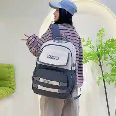 米囹 初中小学生背包 透气舒适 书包 常规 黑色
