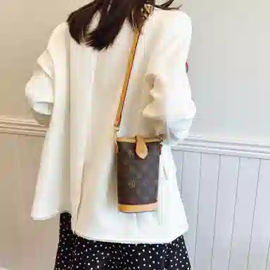 米囹 复古印花 水桶包 单肩手机包 棕色