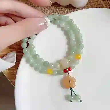 指尖瑰宝 不负春光 踏在绿意盎然的时光里 遇见更明媚的自己 国潮新中式天然 岫玉（蛇纹石玉） 手串 女款