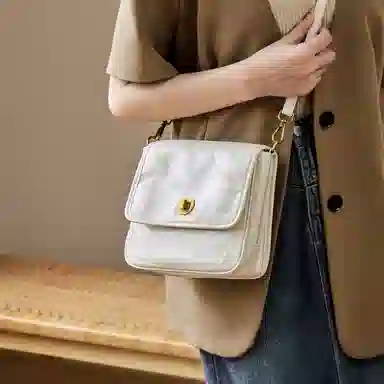 纳兰杜 女包百搭夏天简约潮流 通勤小众品牌包包 头层牛皮拼合成革 邮差包单肩包腋下包斜挎包 小号 女款 白色
