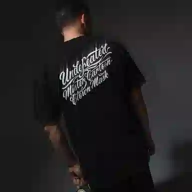 UNDEFEATED x Mister Cartoon SS25 LogoT