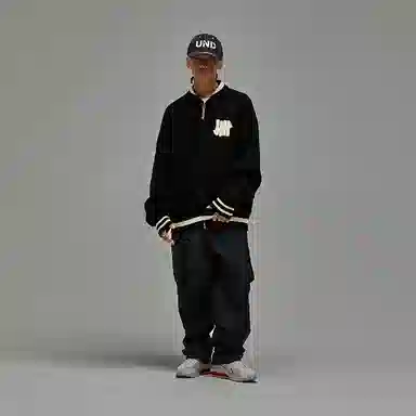 UNDEFEATED FW25 Striped Logo Knit Polo