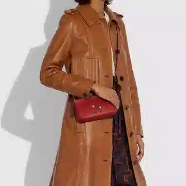 COACH x Disney Kira 19 Logo