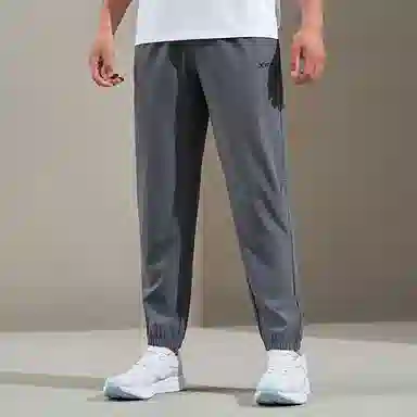 特步 综训系列 纯色中腰舒适百搭透气束脚针织运动裤 男款 珍珠灰