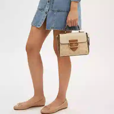 COACH Morgan 21 Logo