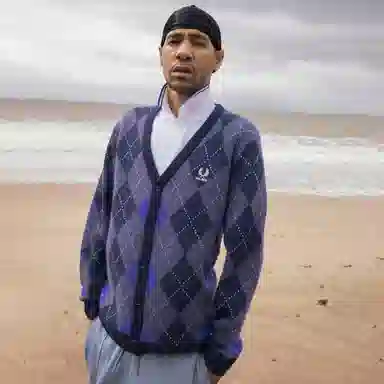 PALACE FRED PERRY FW25 ARGYLE CARDIGAN logo