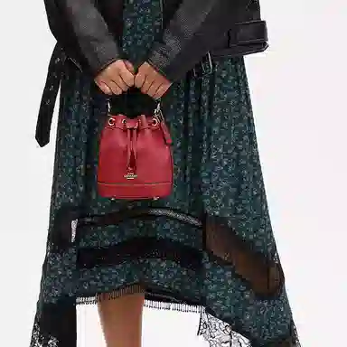 COACH Dempsey 15 Logo