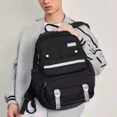 特步 休闲百搭简约 纺织织物 双肩包 男女同款情侣款 黑色