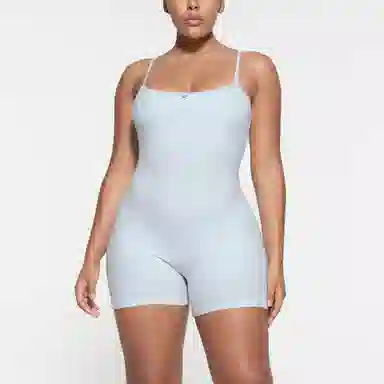 SKIMS Soft Lounge Lace Onesie Celeste