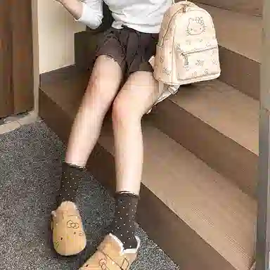 Hello Kitty x Sanrio Black Hawaii Slip-On Shoes