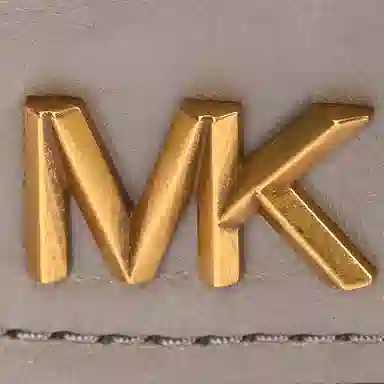 MICHAEL KORS MK DAKOTA Logo