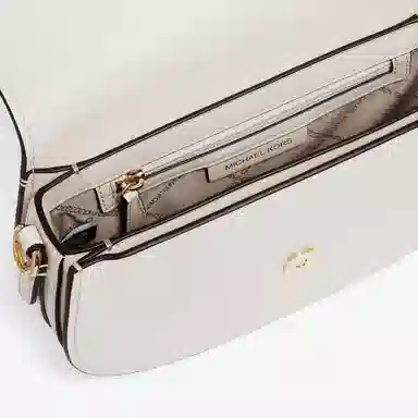 MICHAEL KORS MK Mila logo
