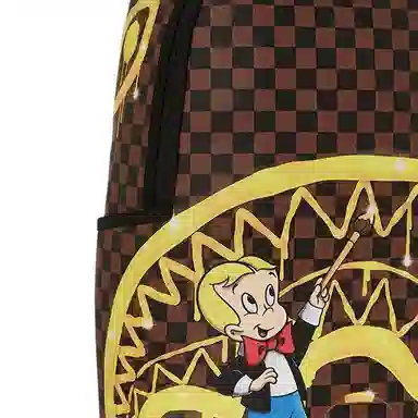 SPRAYGROUND Richie Rich Gold Sharkmouth DLXSV PVC()