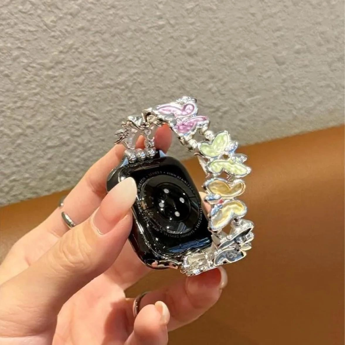 老佳 苹果适用 手表表带 金属材质 蝴蝶金属弹力一体表带男女通用