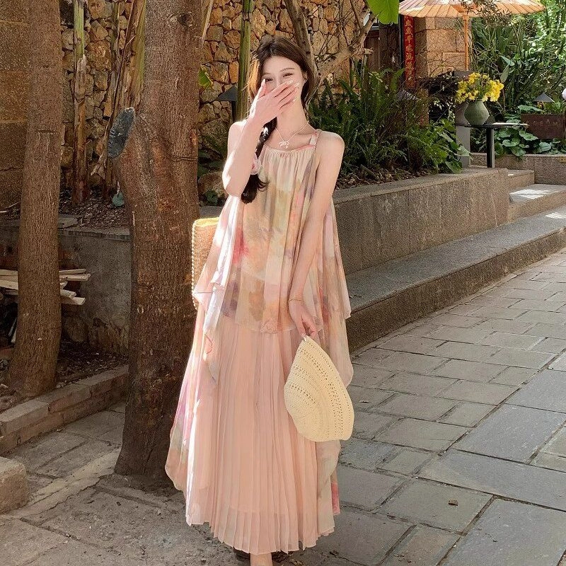 纤丝鸟 温柔气质度假风不规则法式时尚吊带连衣裙 女款