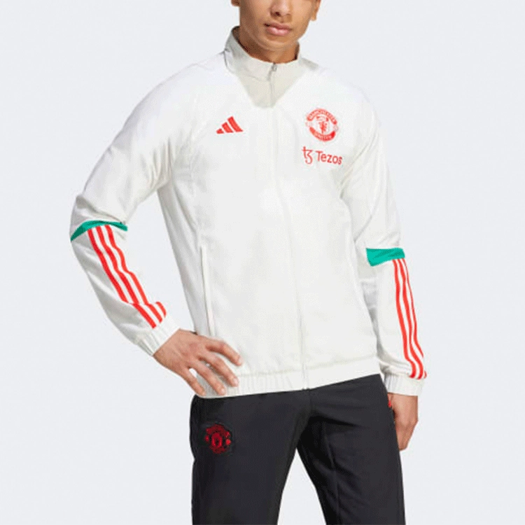 adidas MANCHESTER UNITED TIRO 23 PRESENTATION JACKET logo