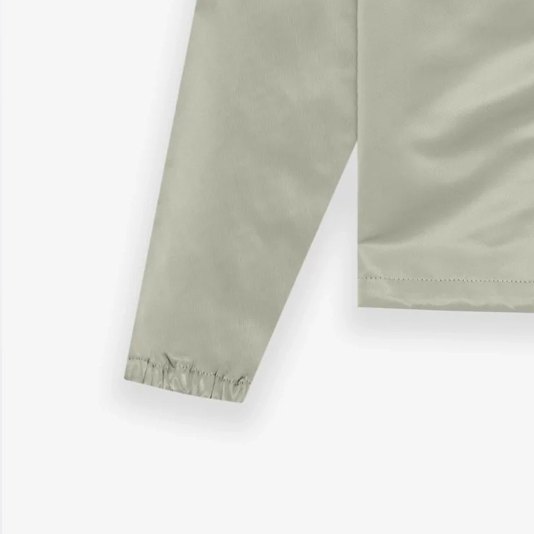 Fear of God Essentials Coaches Jacket Seafoam Logo
