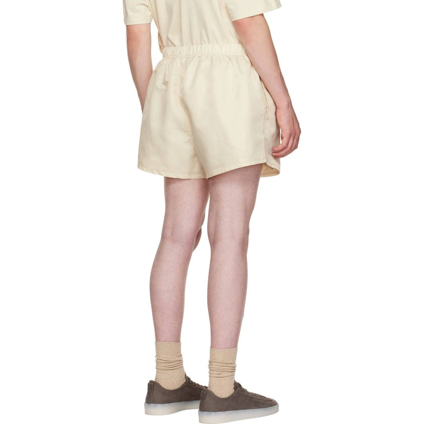 Fear of God Essentials FW22 Nylon Running Shorts Egg shell Logo
