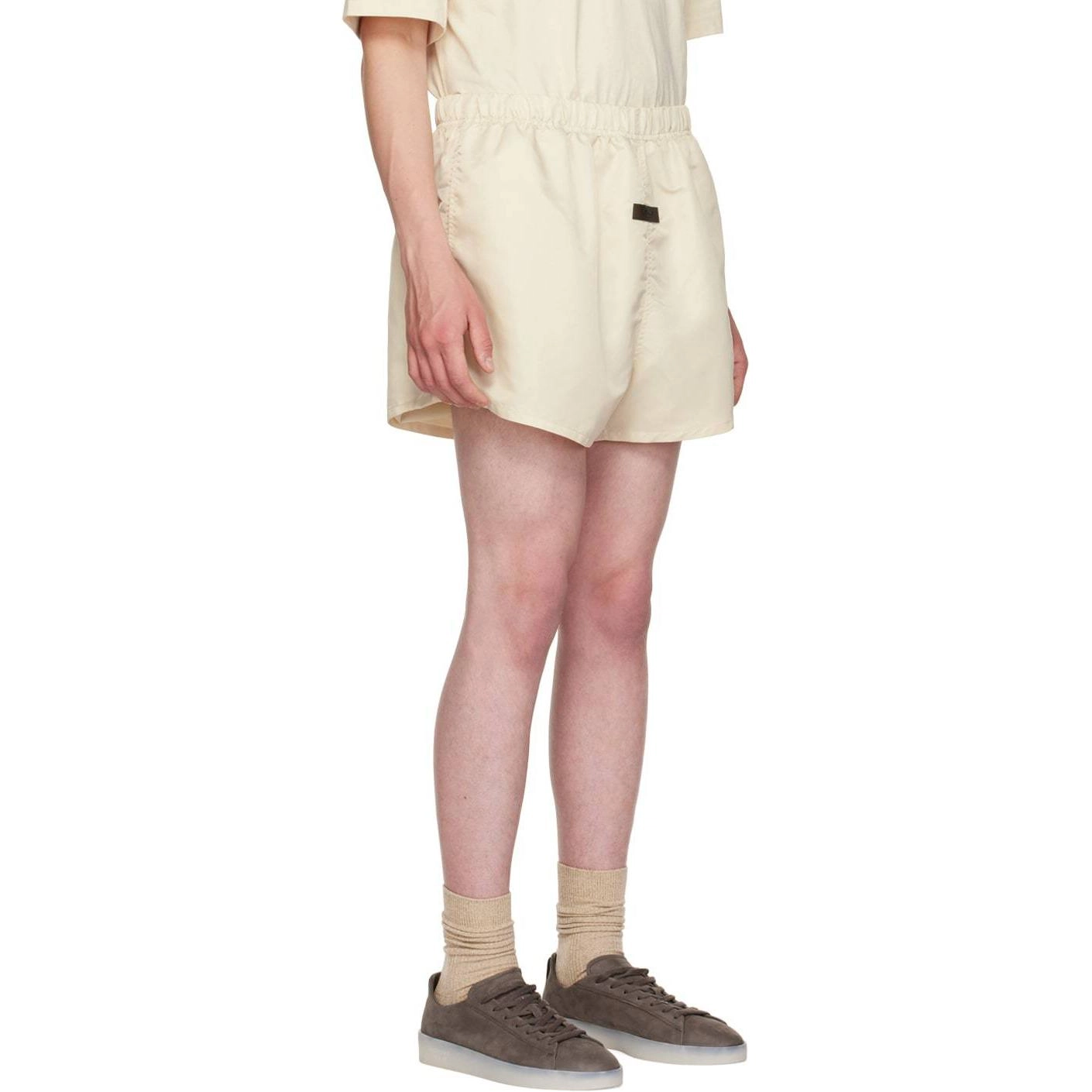 Fear of God Essentials FW22 Nylon Running Shorts Egg shell Logo