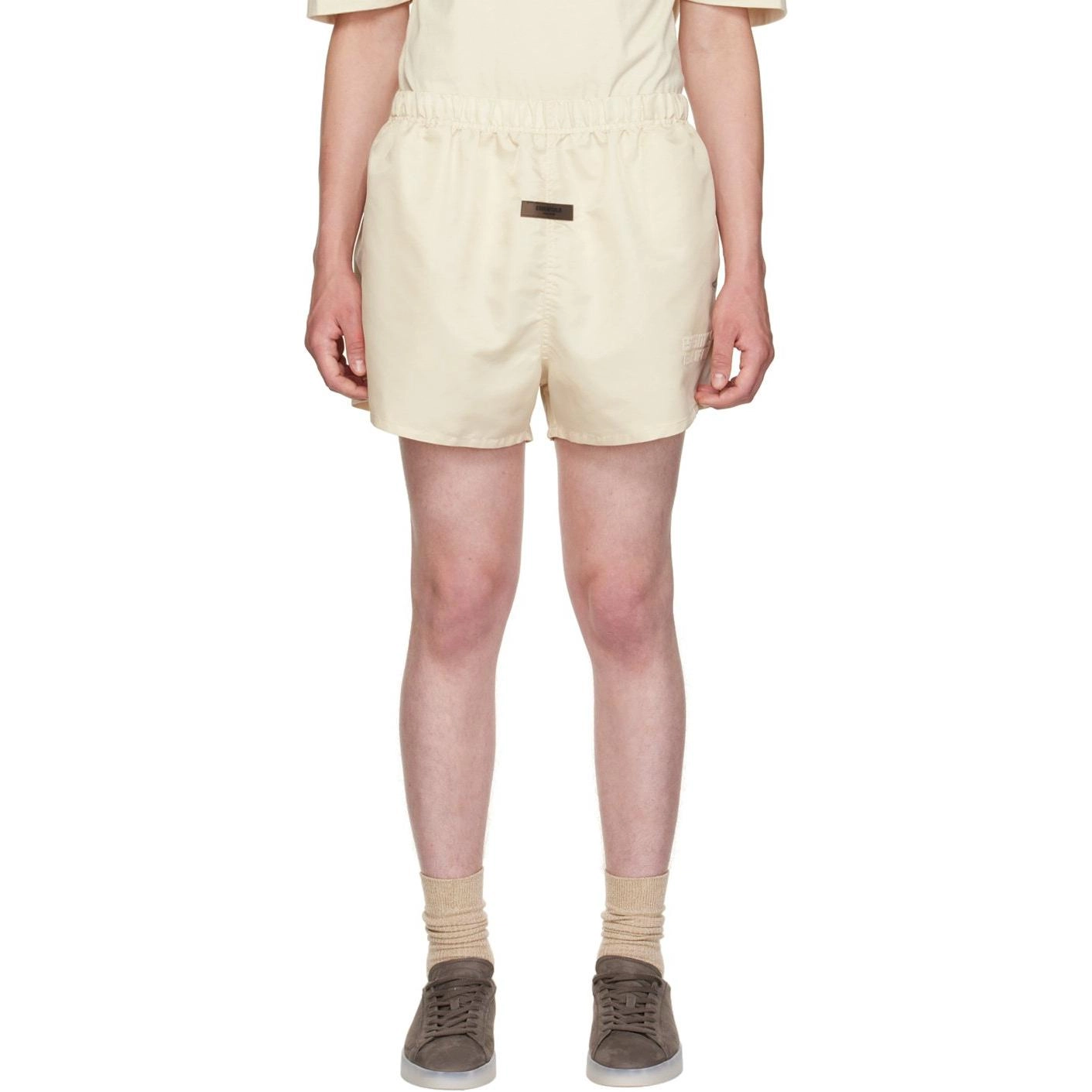 Fear of God Essentials FW22 Nylon Running Shorts Egg shell Logo